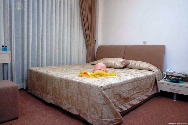 Kamer Suites & Hotel
